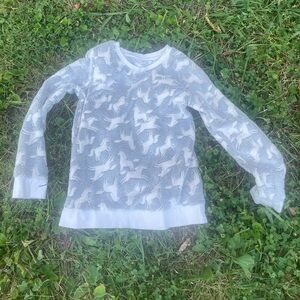 Grey and white animal print sweater.